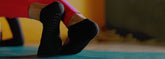 SuperSox yoga socks with non-slip grip sole in grey, designed for comfort and stability during workouts.